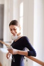 Ballet student using smartphone in studio Royalty Free Stock Photo