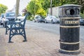 Ballina, County Mayo, Ireland - August 01 2022 : Bin and bench standing in Ballina town.