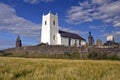 Ballintoy Church of Ireland above barley field, Antrim