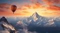 A baloon flying over the mountains in the sunset.