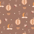 Cute hot air balloons seamless pattern. Hand drawn balloons, clouds, moon and stars in Scandinavian style. Royalty Free Stock Photo