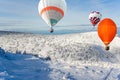 A balloon amid snow in the mountains of Europe. scan from flight altitude.