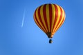 Balloon and an airplane on the blue sky