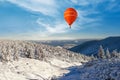 A balloon amid snow in the mountains of Europe. scan from flight altitude.