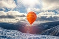 A balloon amid snow in the mountains of Europe. scan from flight altitude.