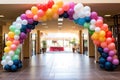 balloon archway at the entrance of the event hall