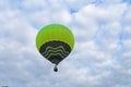 Balloon blue and light green color rises into the sky Royalty Free Stock Photo