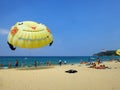 Balloon, bright yellow cartoon on the beach, blue sea, clear sky, resting place in Phuket, Thailand