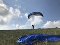 Fly men is a pilot of his body in air. Paragliding and speedflying. Air sport as a way of life. Royalty Free Stock Photo