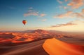 A balloon flying over the sand dunes of the Nambid Naukluft Nationa Park in Namibia