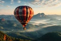 Balloon glide over mountain range, sunrise and sunset wallpaper