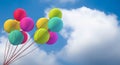 Balloon helium colorful rainbow pink red yellow orange green blue color blue sky cloudy white background wallpaper copy space Royalty Free Stock Photo