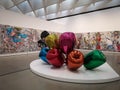 Balloon installation at the Broad museum in Los Angeles with paintings in the background