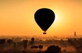 Balloon over plain of Bagan in misty morning, Myanmar Royalty Free Stock Photo