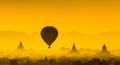 Balloon over plain of Bagan in misty morning, Myanmar Royalty Free Stock Photo