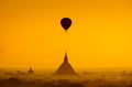 Balloon over plain of Bagan in misty morning, Myanmar Royalty Free Stock Photo