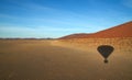 Balloon shadow over namib dunes