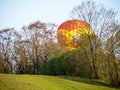 A balloon starting with tourists in the morning light