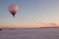 a balloon at sunset in winter, in the north of Russia.