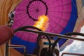 Balloon view from inside, fire from burner. A hot air balloon ride