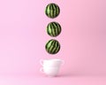 Balloon watermelon with cup on pastel pink background. minimal idea food and fruit concept