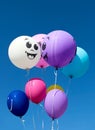 Balloons against blue sky