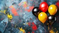 Balloons black, yellow, red on a colored background decorated with paints in the colors of the national flag of Germany Royalty Free Stock Photo