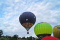 Balloons of blue and yellow color rises into the sky Royalty Free Stock Photo