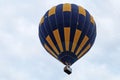 Balloons of blue and yellow color rises into the sky Royalty Free Stock Photo