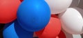 Balloons. Bright blue, red, white helium latex balloons. A group of balloons for decorating a children`s party, birthday Royalty Free Stock Photo