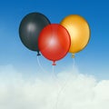 Balloons in the colors of the German flag Royalty Free Stock Photo