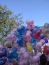 Colorful Ballons at Disneyland floating in the air.