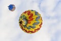 Balloons drifting directly overhead