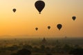 Balloons fly over thousand of temples in sunrise in Bagan, Myanmar