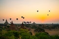 Balloons fly over thousand of temples in sunrise in Bagan, Myanmar