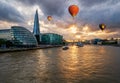 Balloons flying upon Thames rives in London