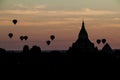 Balloons over Bagan and the skyline of its temples, Myanmar. Sulamani temple and Shwesandaw pagod Royalty Free Stock Photo