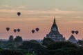 Balloons over Bagan and the skyline of its temples, Myanmar. Sulamani temple and Shwesandaw pagod Royalty Free Stock Photo