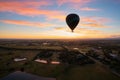 Balloons over vineyards in Pokolbin wine region at sunrise, Hunter Valley, NSW, Australia