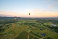 Balloons over vineyards in Pokolbin wine region at sunrise, Hunter Valley, NSW, Australia