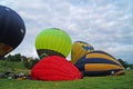 Balloons of blue and yellow color rises into the sky Royalty Free Stock Photo