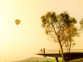 Balloons start they flight over field and forest Royalty Free Stock Photo