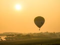 Balloons start they flight over field and forest Royalty Free Stock Photo