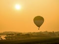 Balloons start they flight over field and forest Royalty Free Stock Photo