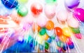 Balloons under the ceiling in motion blur