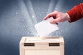 Ballot box with person casting vote Royalty Free Stock Photo