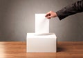 Ballot box with person casting vote Royalty Free Stock Photo