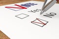 A ballot voting in elections and the voter marks red tick in NO checkbox