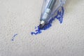 Ballpoint pen tip, scribbling on a white leather sofa, or car seats. Royalty Free Stock Photo