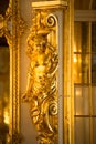 Golden statue in ballroom of roccoco palace Catherine Palace,  located in the town of Tsarskoye Selo or Pushkin St. Petersburg Royalty Free Stock Photo